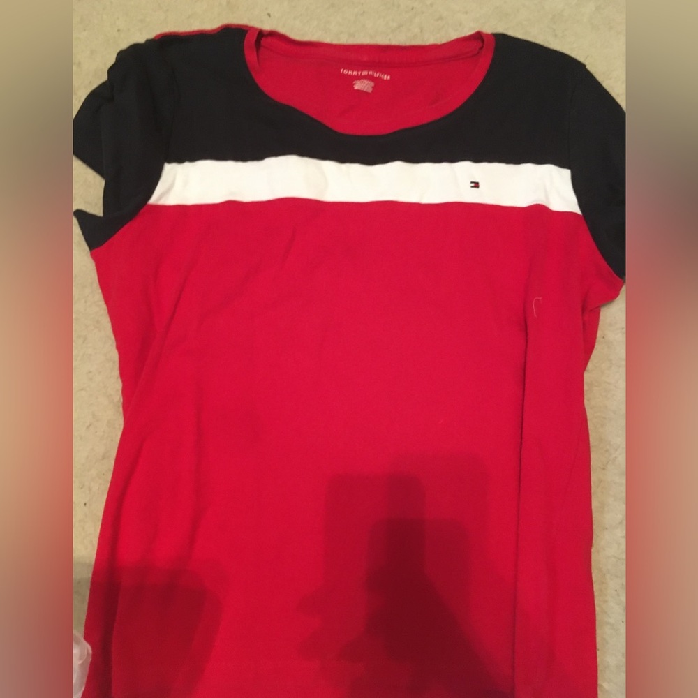 Used Tommy shirt xxl women’s fits smaller more like a medium but lots of stretch